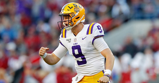 Heisman Trophy winner and Ohio-native Joe Burrow is likely to join the AFC North as the Bengals' No. 1 pick in the 2020 draft. (USAToday.com)