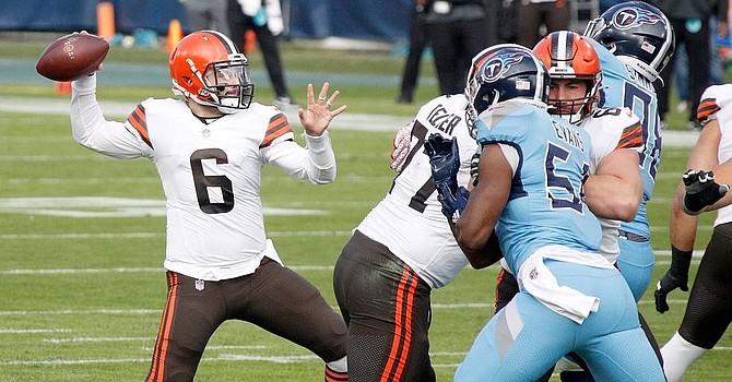 Baker Mayfield became the first Browns quarterback since Otto Graham to throw four touchdowns in the first half in Browns' 41-35 win over Tennessee. (Frederick Breedon/Getty Images)