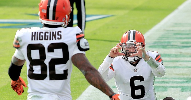 Baker Mayfield did it all against Tennessee, including serving as the paparazzi during Rashard {Hollywood] Higgins' stroll down the red carpet after a touchdown. (Andy Lyons/Getty Images)