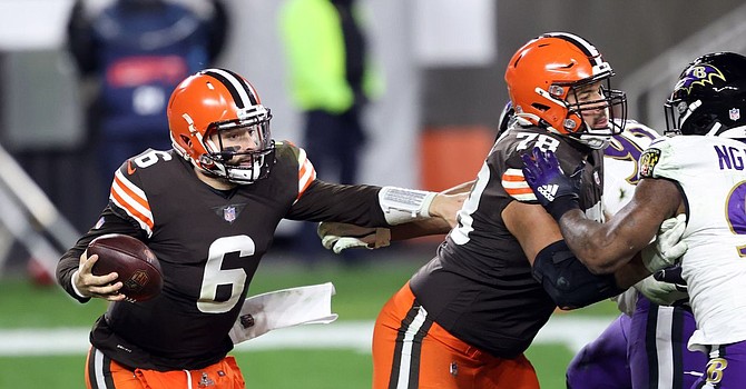 Baker Mayfield overcame a third quarter interception with a fourth quarter five-yard touchdown run. (Joshua Gunter, Cleveland.com)