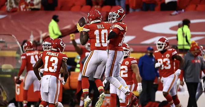 Tyreek Hill celebrates a successful fourth down conversion to seal a Chiefs' victory as Kansas City heads back to the AFC Championship. (Jim Berry/Kansas City Chiefs)