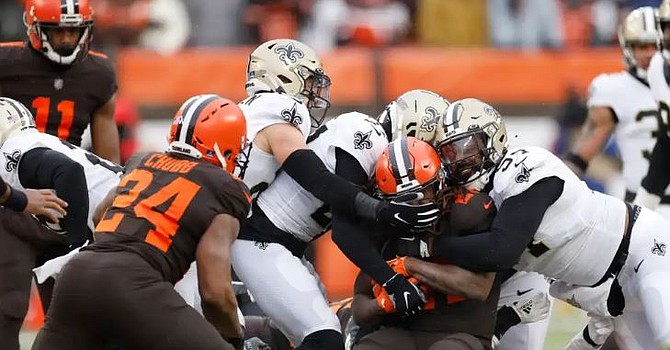 Once the Saints stopped Kareem Hunt cold on this third-and-1 carry in the third quarter, the Browns went into pass-happy mode. (Associated Press)