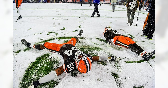 Several Browns celebrated their first-ever snow game by doing snow angels on the field after the 24-19 win over the Pittsburgh Steelers. (Cleveland Browns)