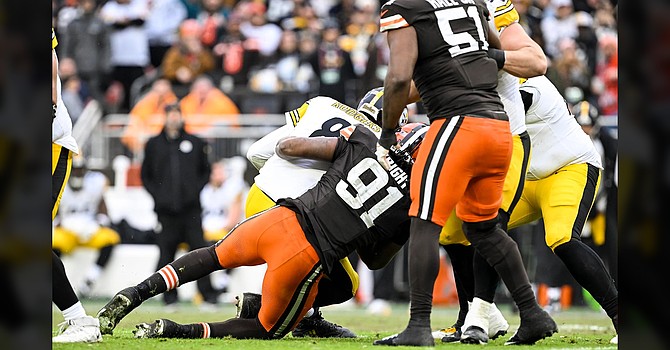Myles Garrett didn't get the one sack to break the NFL season record, but Alex Wright and Grant Delpit were credited with takedowns of Aaron Rodgers. Garrett's menacing presence forced Rodgers to hurry every one of his 39 throws. (Cleveland Browns)